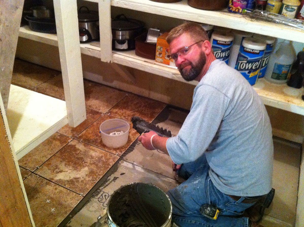 Mark McNeill laying tile in pantry IMG 1908