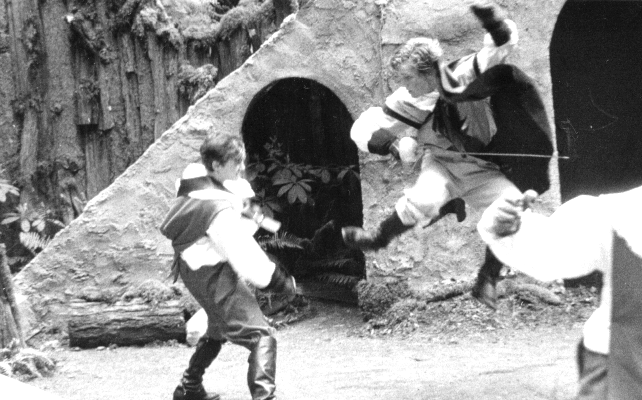 Swordplay between Rocheford (Don Fleming) and Aramis (Arne Moen) Swordplay between Rocheford (Don Fleming) and Aramis (Arne Moen)